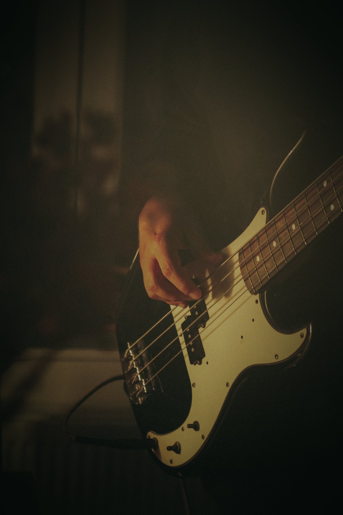 Bassist playing at night